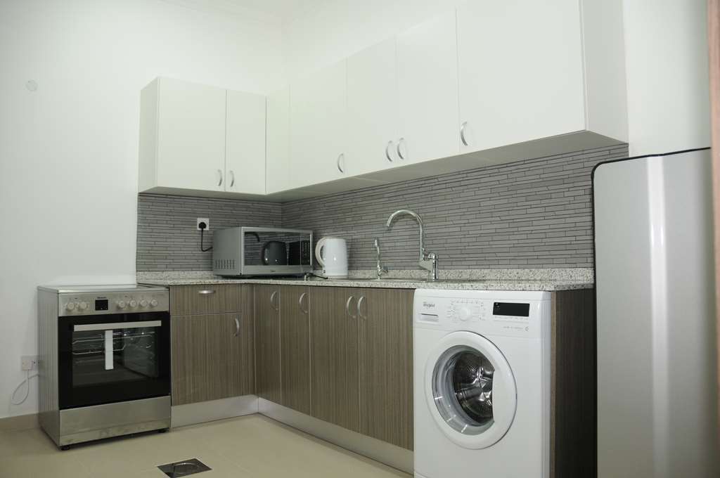 Al Muhanna Plaza Luxury Apartments Кувейт Номер фото
